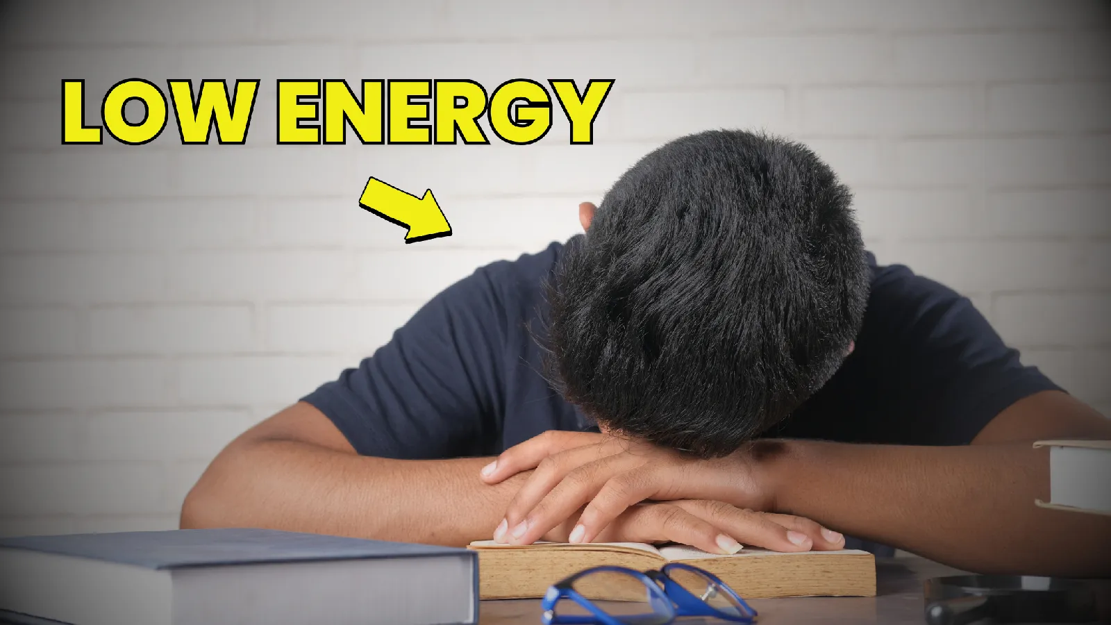 teenage-boy-sleeping-while-studying